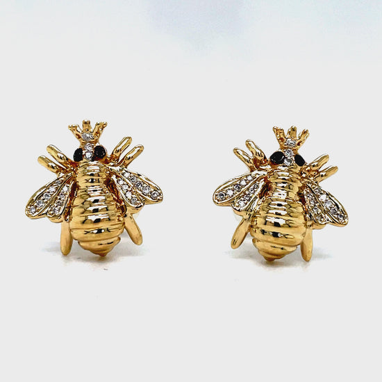 Indulge in exquisite luxury with our 14k Yellow Gold Diamond Queen Bee Earrings. Crafted from premium 14k gold, these bee stud earrings feature a charming 14.00 mm size adorned with sparkling 0.12 ct round diamonds. Effortlessly secure them with smooth friction backs for a truly elegant and exclusive look.
