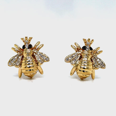 Indulge in exquisite luxury with our 14k Yellow Gold Diamond Queen Bee Earrings. Crafted from premium 14k gold, these bee stud earrings feature a charming 14.00 mm size adorned with sparkling 0.12 ct round diamonds. Effortlessly secure them with smooth friction backs for a truly elegant and exclusive look.