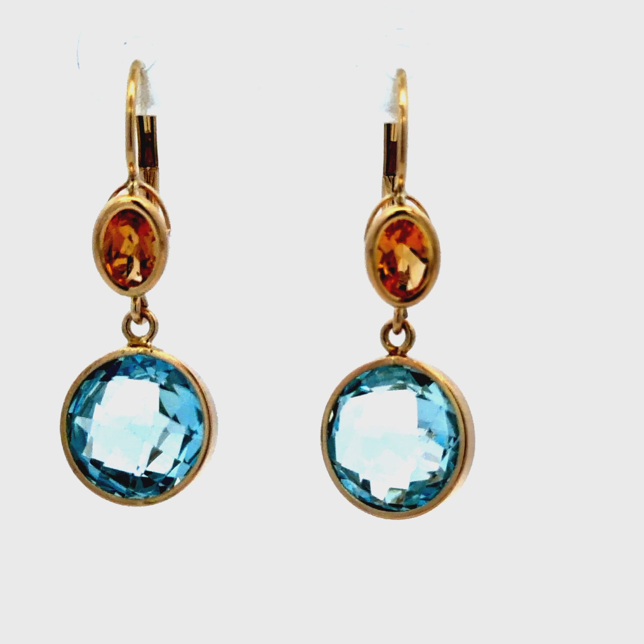 Try on video of 14k Yellow Gold Blue Topaz & Citrine Drop Earrings