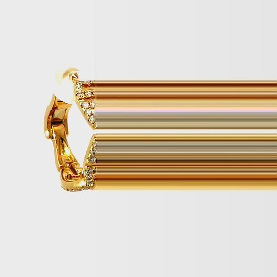 Try on view of 18k Yellow Gold Interlink Diamond Hoop Earrings