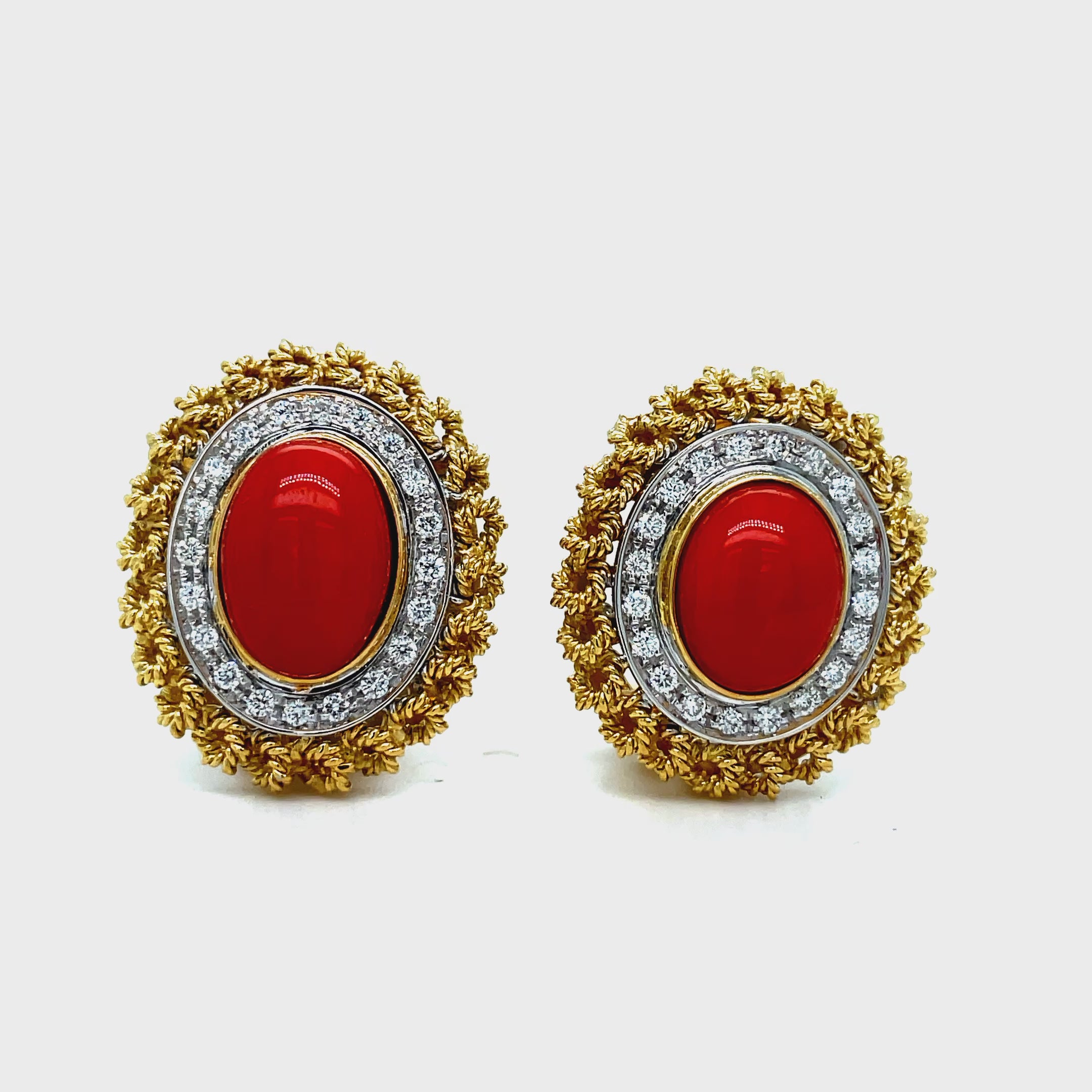 Indulge in luxury with our 18K Italian Made Coral and Diamond Rope Earrings. The secure omega clips provide a comfortable and worry-free fit. The vibrant red coral and matte finish make a bold statement. Elevate any outfit with these 21 x 19.00 mm earrings. Effortlessly chic.