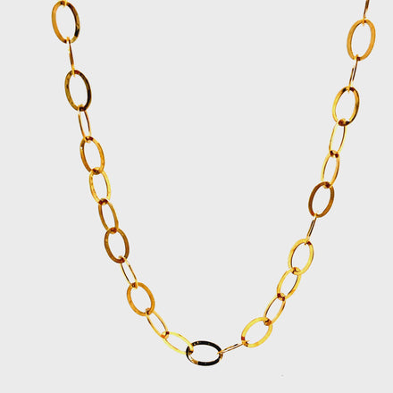 Crafted from 14k yellow gold, this long necklace boasts an enchanting oval open link design. Lightweight yet durable, it's perfect for adding a touch of elegance to any outfit. With a length of 30", it's versatile and easy to style for any occasion. Elevate your look with this luxurious piece.