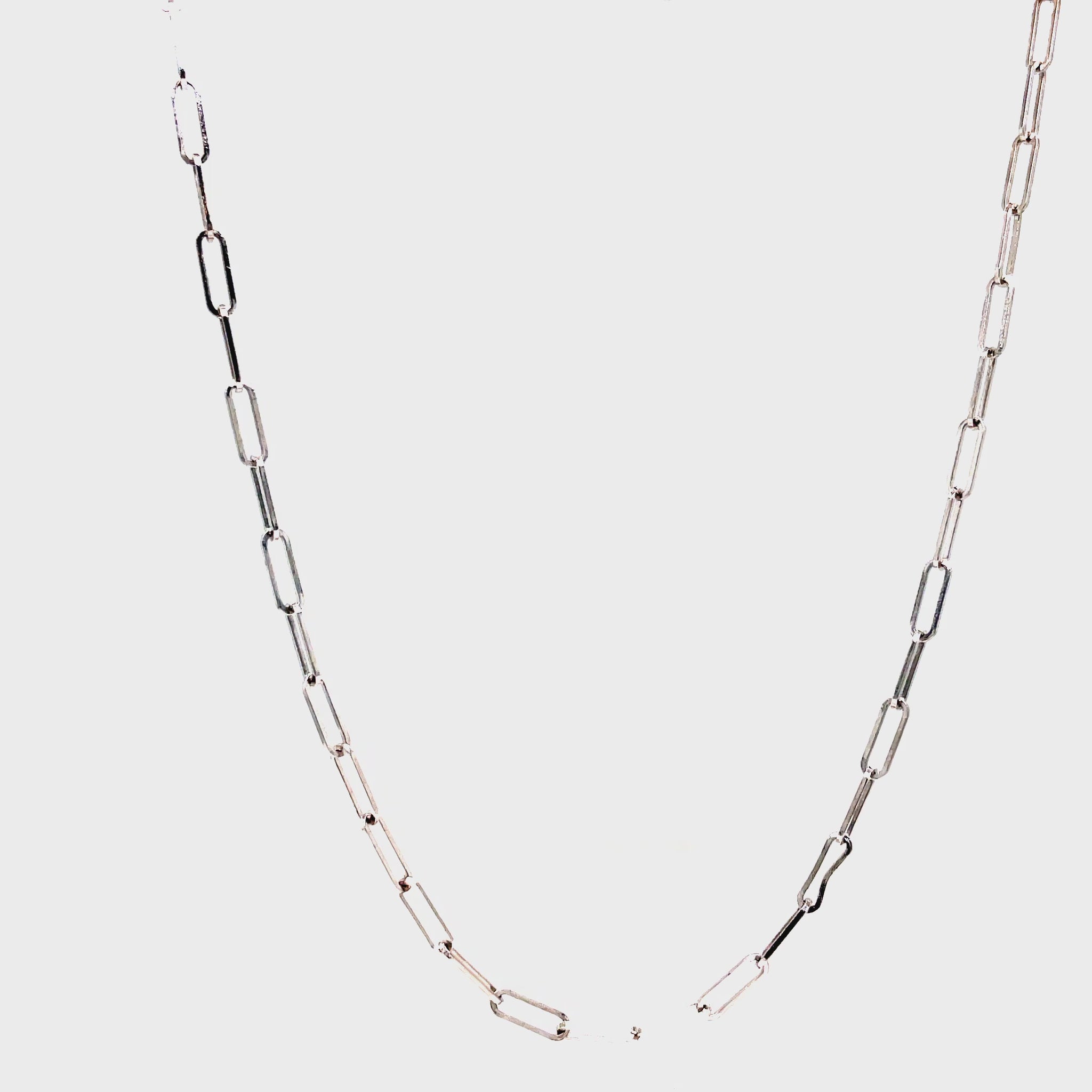 Crafted from 14k white gold, this chic paperclip link necklace is 18" long and features a secure lobster catch for a secure fit. Its delicate 2.00 mm thickness is simply exquisite.