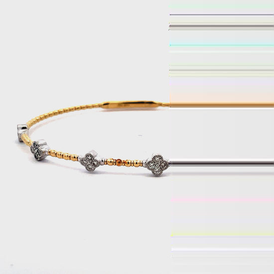 Try on video of 14k Flexible White and Yellow Gold Seven Station Diamond Bangle Bracelet 
