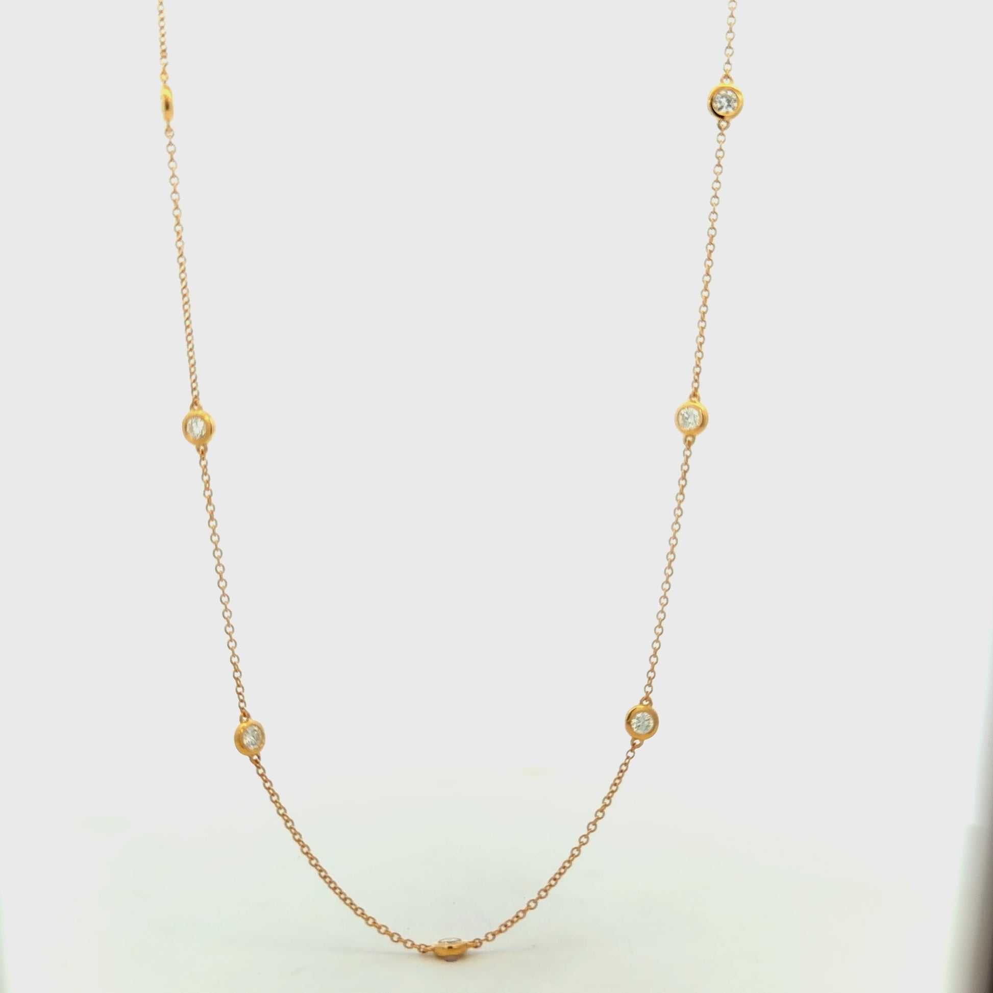 Try on video of 18k Yellow Gold Bezel Set Diamond Station Necklace 1.29 cts