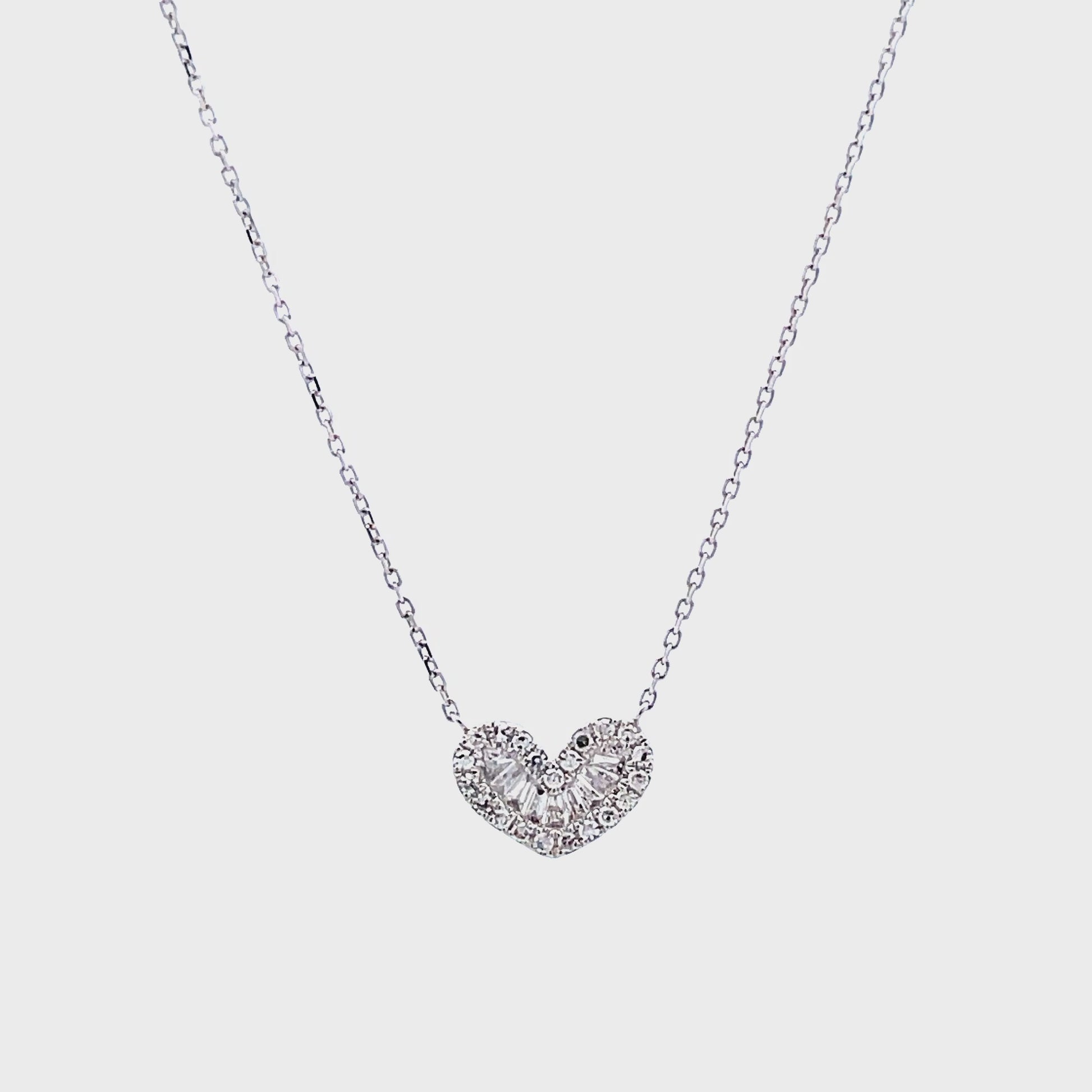 Try on video of 18k White Gold Small Baguette Diamond Heart Necklace