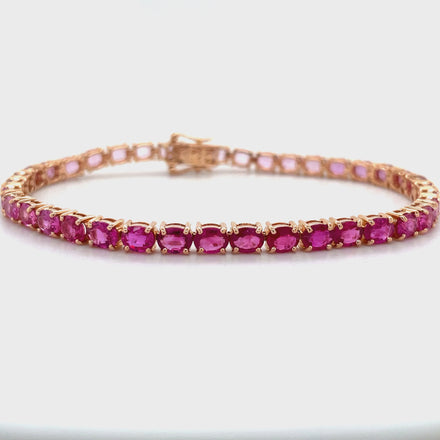 This stunning 18k rose gold bracelet features high quality oval cut multi-shade pink sapphires, from deep hot pink hues to soft lavender shades. The delicate design showcases the vibrant colors and offers a unique bracelet for any occasion.