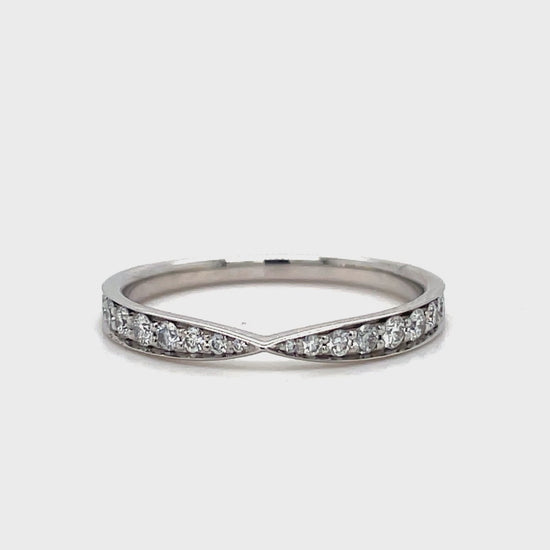 This stunning Estate Tiffany and Co. Diamond Wedding Band features a unique v-shape design adorned with brilliant round diamonds. Crafted from luxurious platinum, this band is an elegant and exclusive choice for your special day. Add a touch of sophistication and luxury to your wedding ensemble with this one-of-a-kind piece from Tiffany and Co.