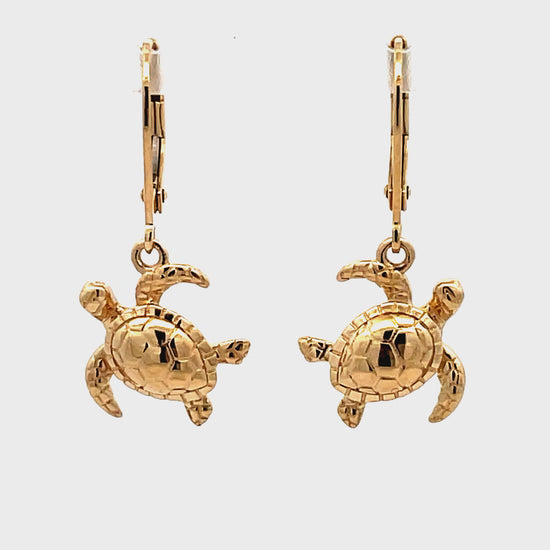 Try on video of 14k Yellow Gold Turtle Earrings