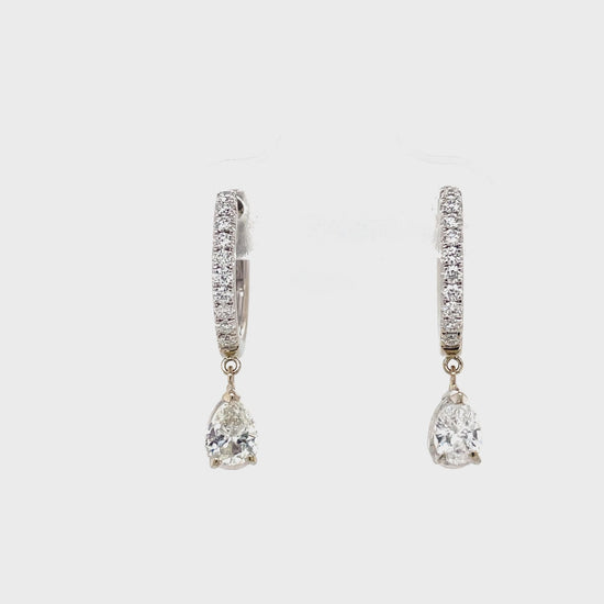 Front and Side View of Pear Shape Diamond Dangling Earrings