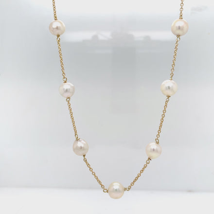 ndulge in the elegance of our 14k Yellow Gold Station Pearl Necklace. Crafted with a heart solid clasp, this 16" necklace features 14 lustrous cultured pearls, each measuring 8.00mm. A luxurious addition to any wardrobe, perfect for those who appreciate the finer things in life.