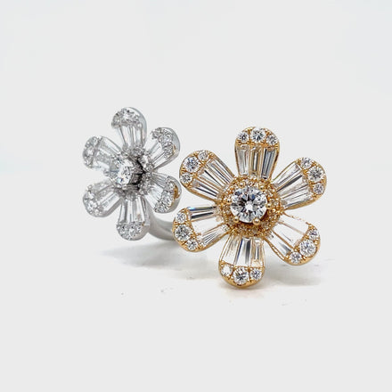 This stunning 18k two tone ring features a mesmerizing mix cut of round and baguette diamonds totaling 2.02 carats. The unique daisy flower style adds a touch of nature's beauty to this luxurious piece. Elevate your style with this exquisite floating double daisy flower ring.