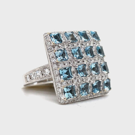 Introducing our Italian-made Aquamarine and Diamond Fashion Ring. Hand-engraved with a square design, this ring radiates luxury and sophistication. Crafted with 18k white gold, a 2.20 carat cushion-cut aquamarine and 1.49 carats of sparkling round diamonds, this piece is a masterpiece of elegance. Elevate your style with this exclusive and timeless ring.