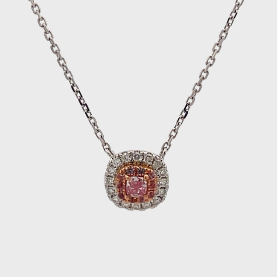 Watch video of front view and side view of Fancy Pink Diamond and Diamond Bezel Pendant Necklace 