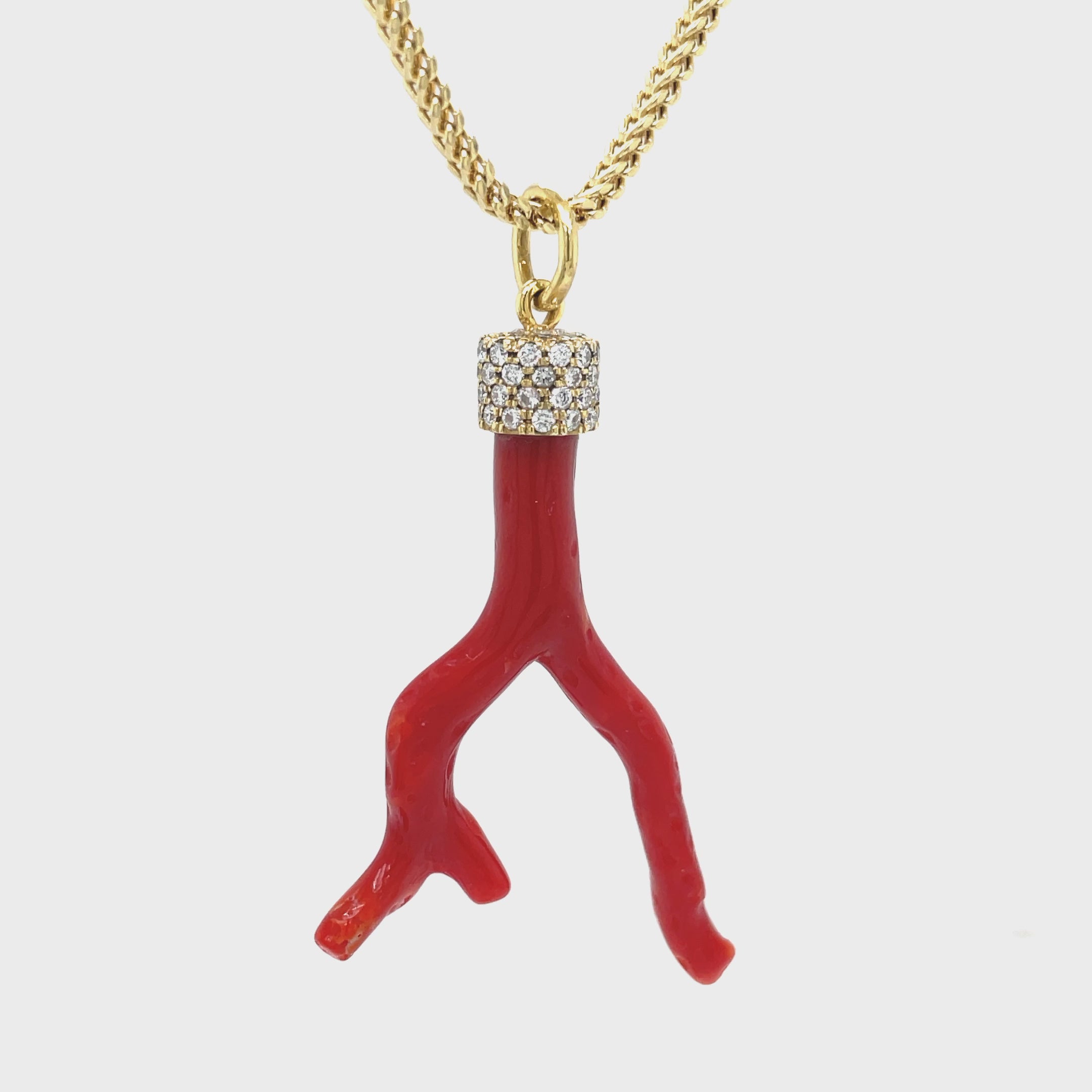 ndulge in pure luxury with our Red Coral Branch Diamond Cap Necklace. Adorned with a striking red coral branch and accented by round diamonds totaling 0.50 carats, this 30" necklace is a true statement piece. Crafted with 18k yellow gold, it exudes sophistication and exclusivity. Elevate your style with this elegant and timeless necklace. Handmade in our store

Chain sold separately $390.00 lightweight wheat chain