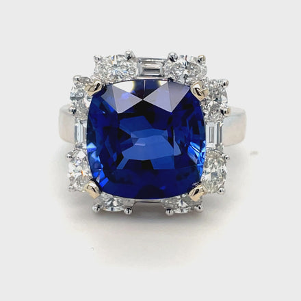 Step into elegance with our Cushion Cut Tanzanite & Diamond Cocktail Ring. Featuring a stunning 9.20 carat cushion cut tanzanite stone, accented by 80 round diamonds 1.28 cts and 4 baguette diamonds 0.54 cts. Set in luxurious 18k white gold. Elevate your style and make a statement with this exquisite ring!