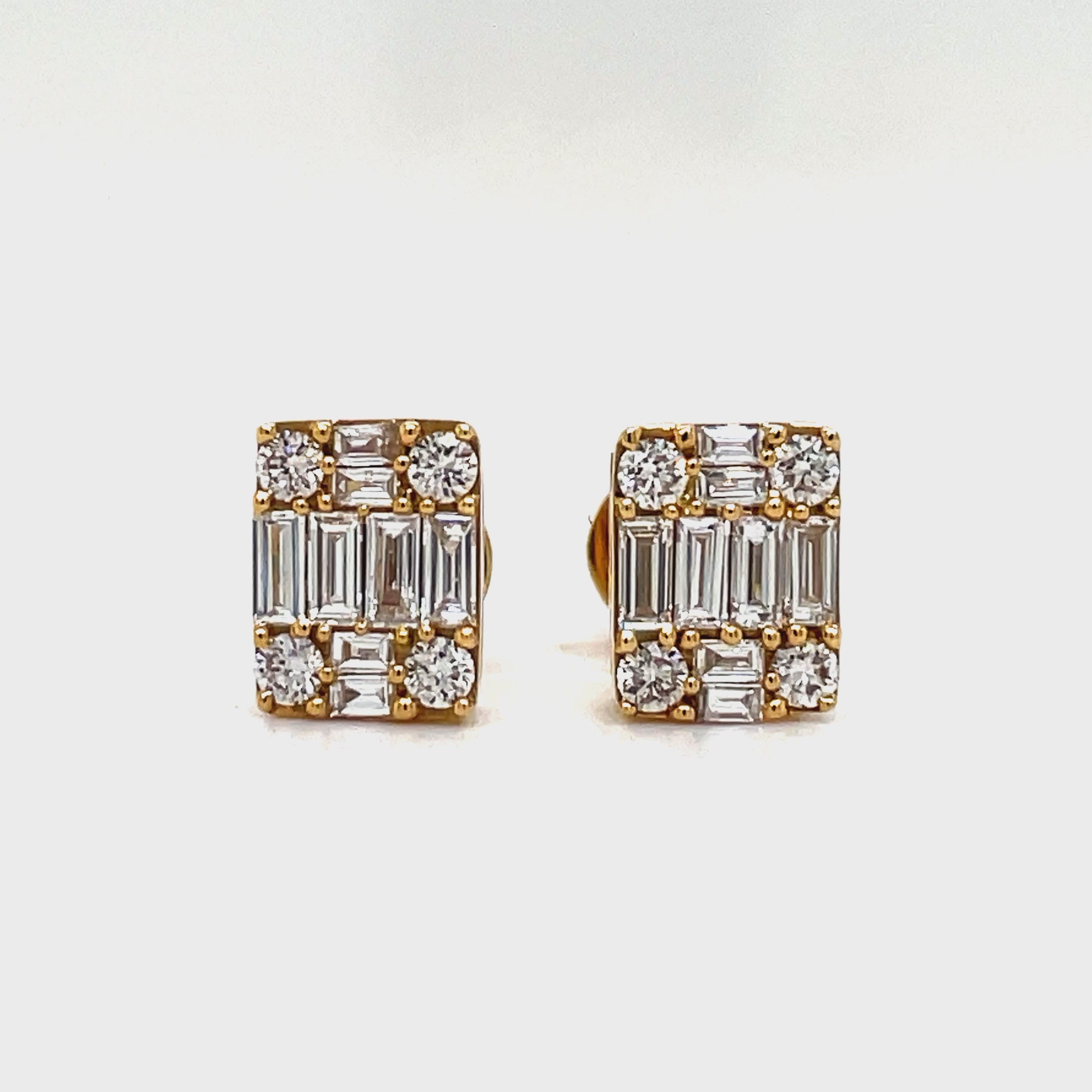 Indulge in luxury with our Square Baguette &amp; Round Diamond Stud Earrings. Exquisitely crafted with 18k yellow gold, these earrings feature 0.51 cts of round and baguette diamonds. Complete with secure heart-shaped friction backs, these 7.00mm earrings are a timeless addition to your collection.