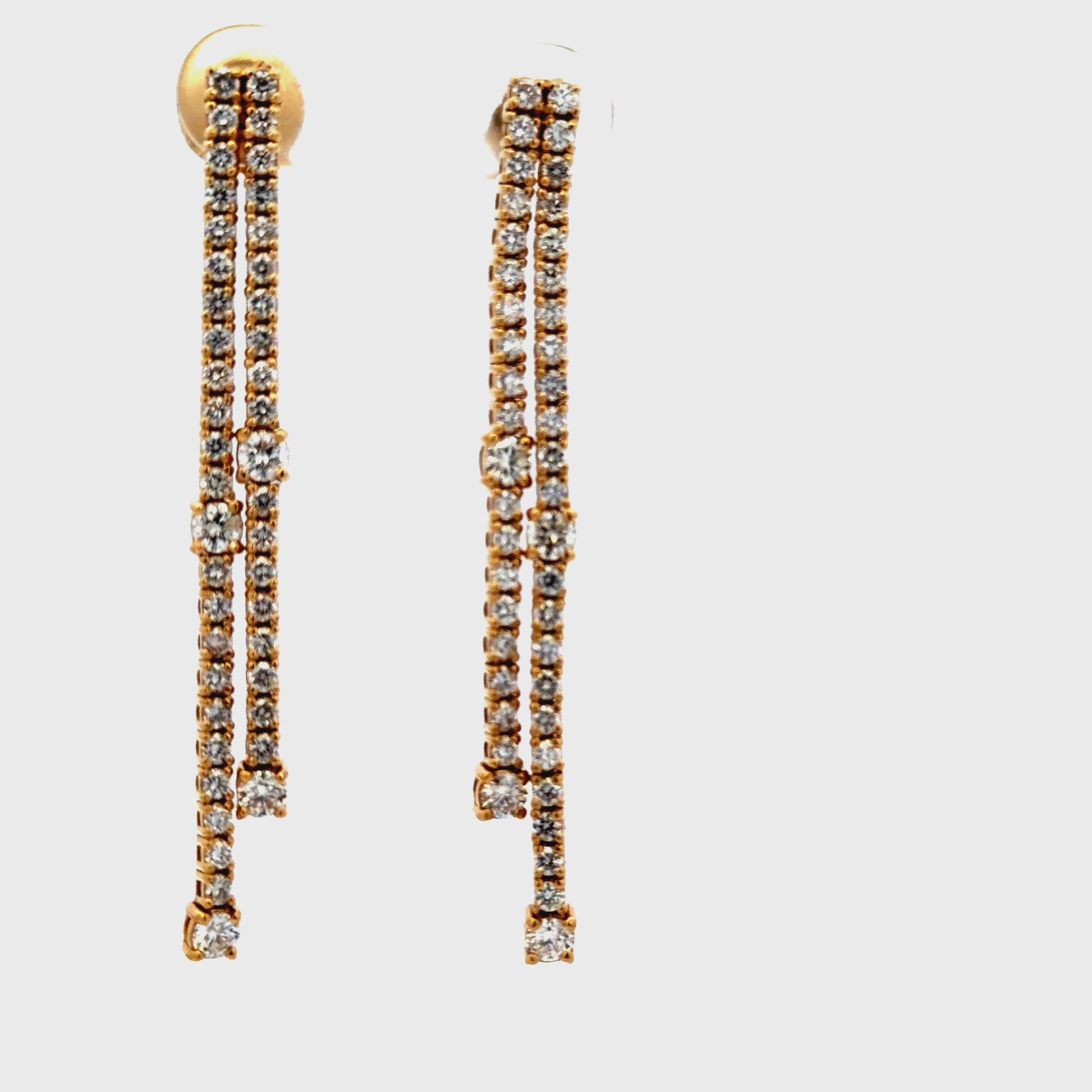 Try  on view of 14K Yellow Gold Double Strand Diamond Dangle Earrings