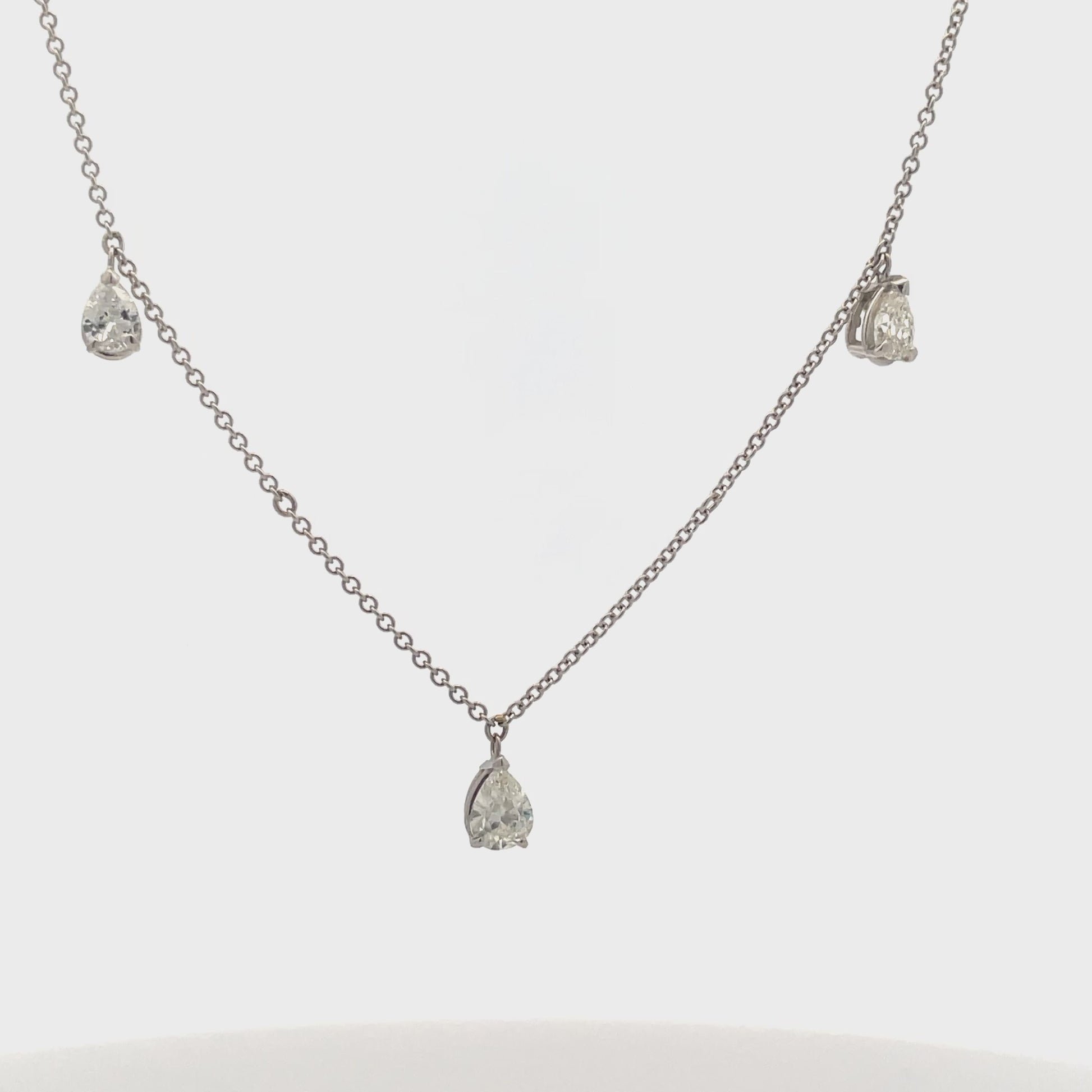 Watch video of front view of Pear Shape Diamond Three Station Necklace 1.00 cts