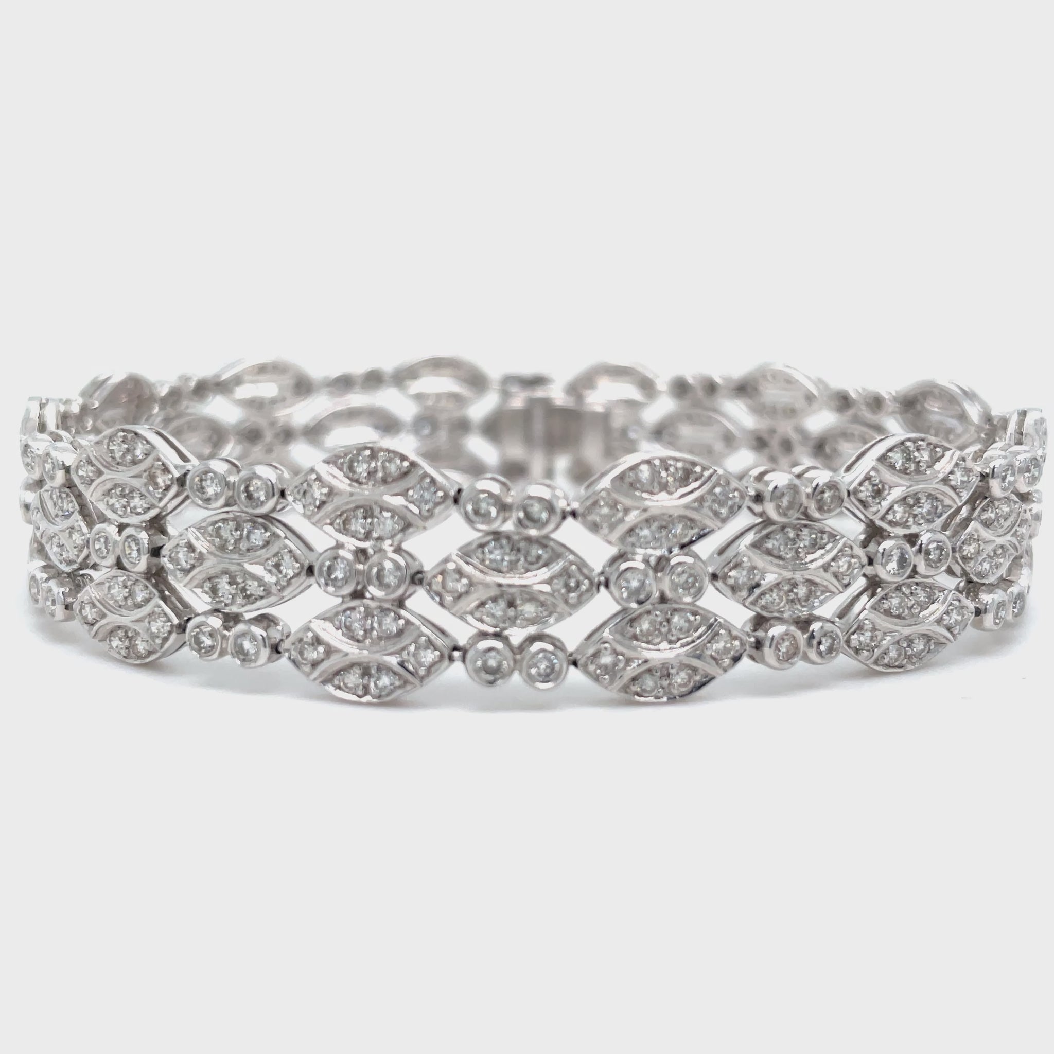 ndulge in elegance with our Diamond Pave Set Link Bracelet. Made with platinum and adorned with round diamonds totaling 4.15 cts, each diamond pave link sparkles with sophistication. With a hidden clasp and 7" length, this bracelet is the epitome of luxury. Elevate your style today.