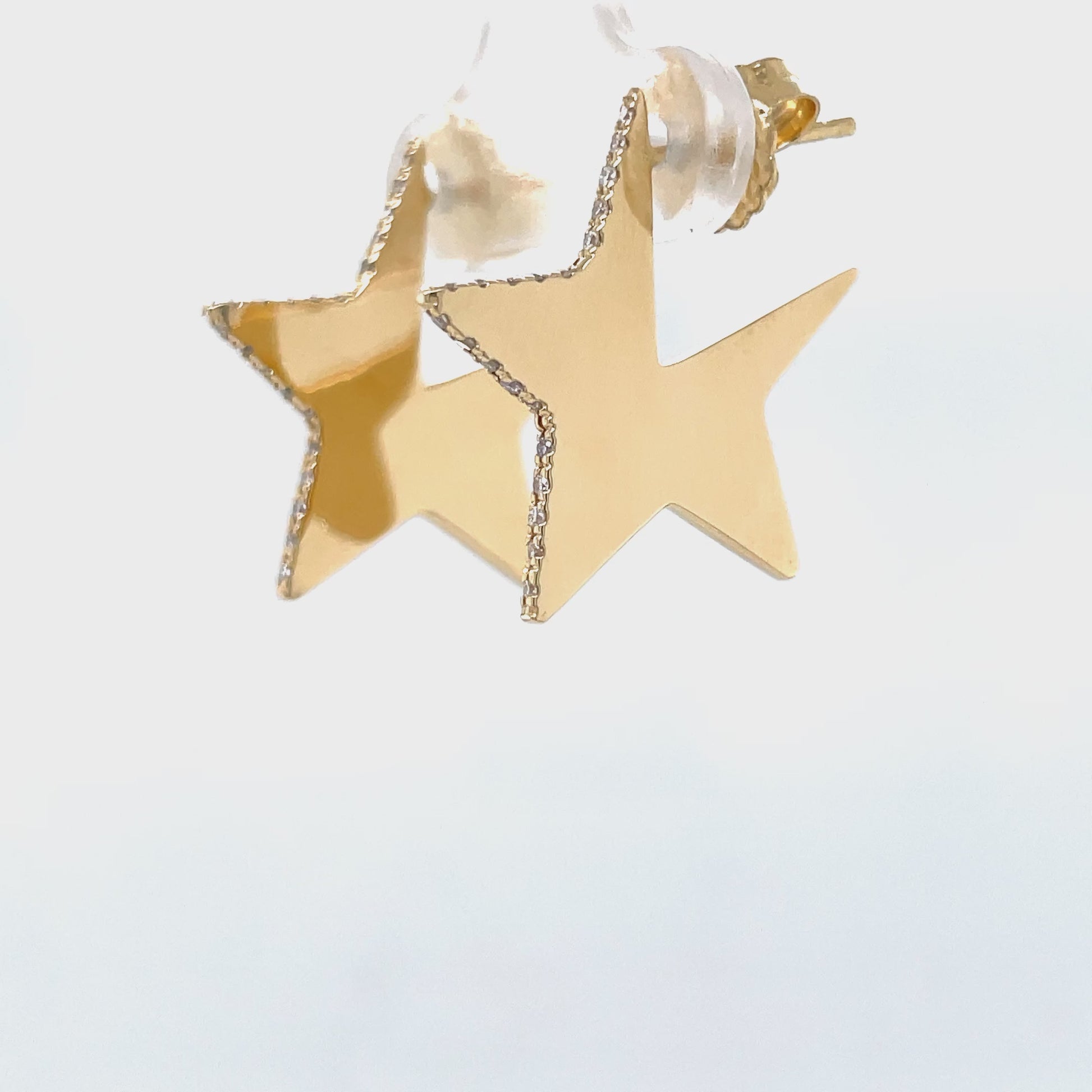 Try on video of 14k Yellow Gold Diamond Large Star Diamond Earrings 