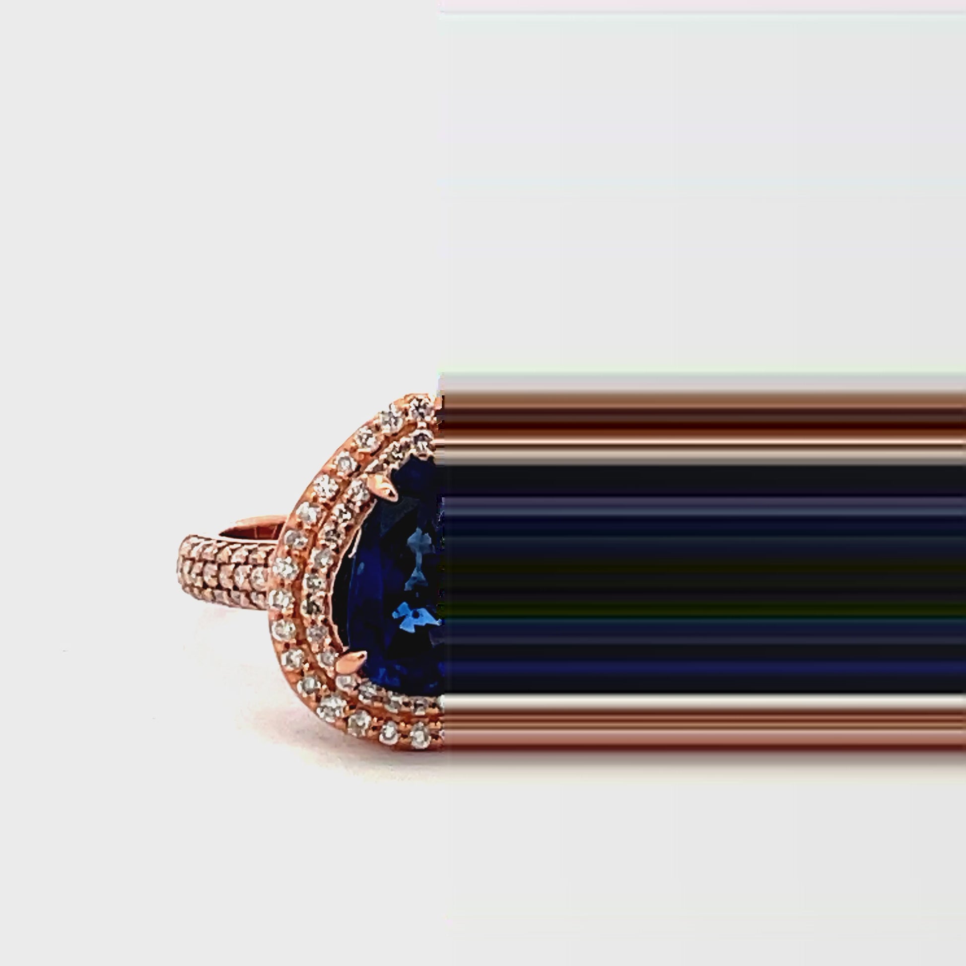 Try on  view of 18k Rose Gold Pear Shape Oval Sapphire Double Row Diamond Ring 