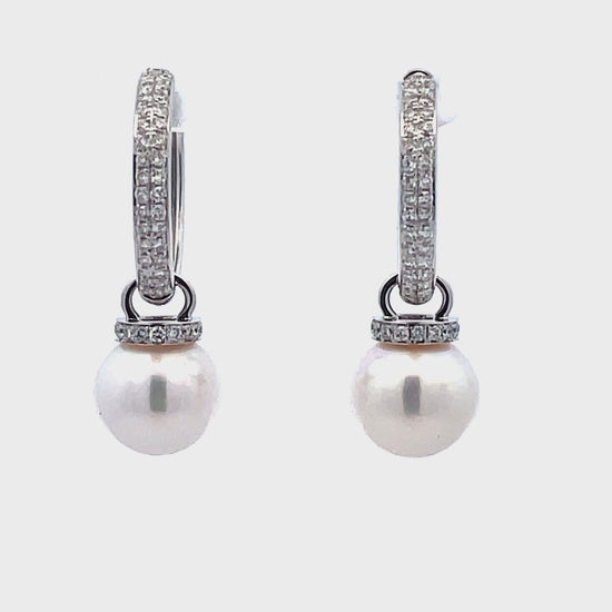 Try on video of 14k White Gold Diamond Huggie Pearl Earrings
