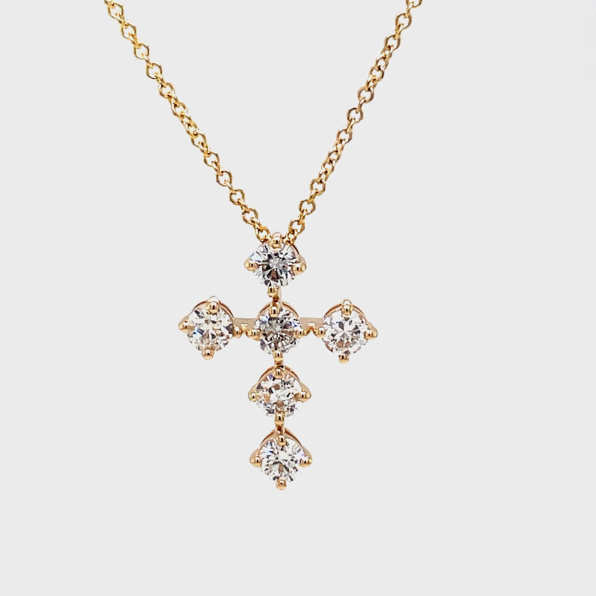 This stunning Classic Share Prong Diamond Cross Pendant Necklace is a timeless piece. Crafted from 14k yellow gold, it features a diamond cross with 1.00 cts of color E/F and VS1 clarity, for a beautiful sparkle. Perfect for any special occasion.