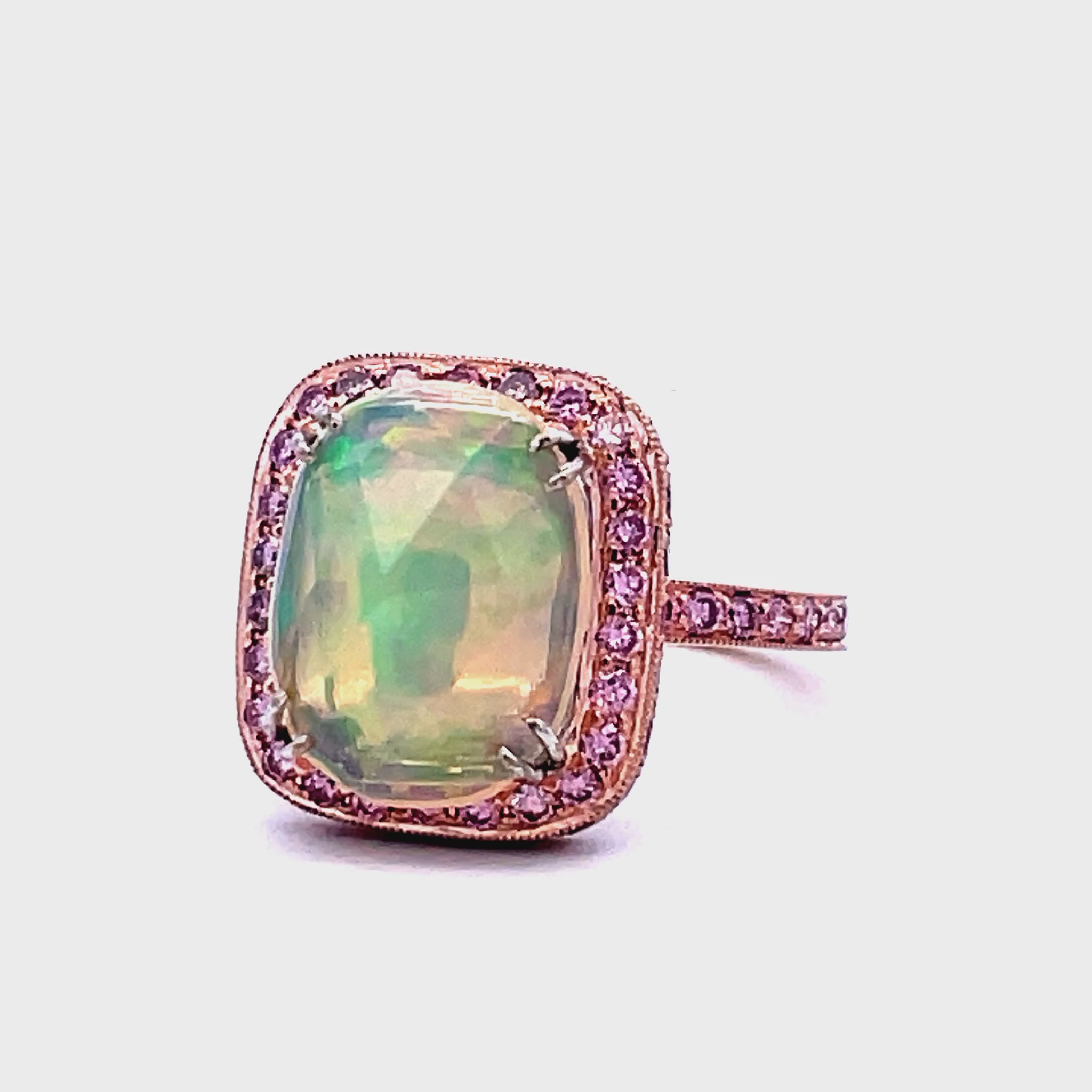 Try on video of 18k Rose Gold Ethiopian Oval Opal and Pink Diamond Ring