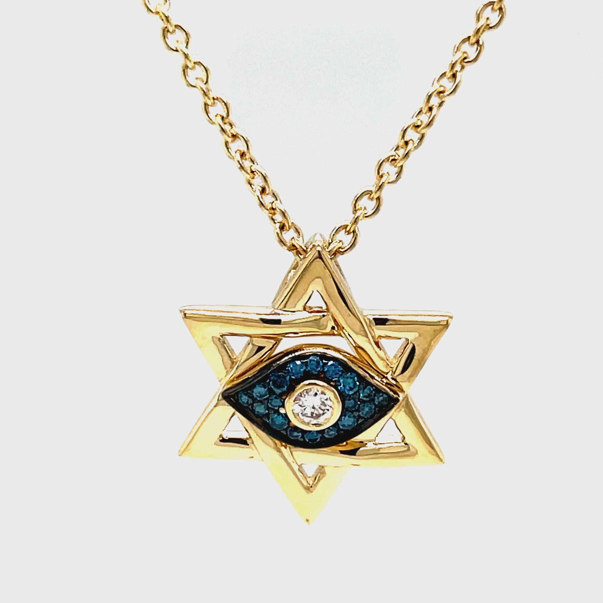 Discover the beauty of our 14k Diamond Star of David Necklace. Handcrafted with 15.00 mm of 14k yellow gold and adorned with round and blue diamond's totaling 0.16 cts. The 18" long chain features a secure lobster clasp with a sizing loop at 16", ensuring a perfect fit. Elevate your style and embrace luxury with this exclusive piece.