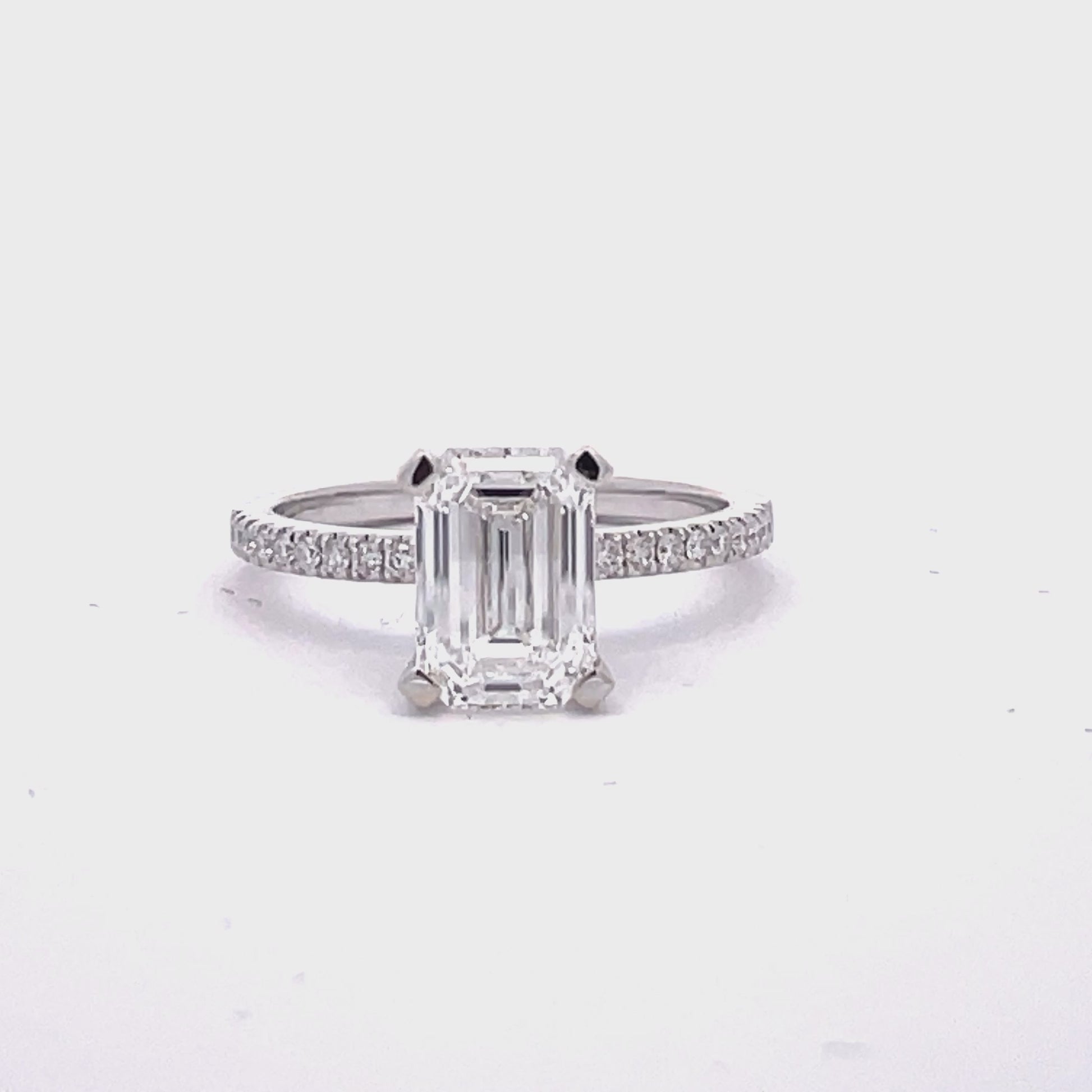 Watch front view of Emerald Cut Diamond Engagement Ring