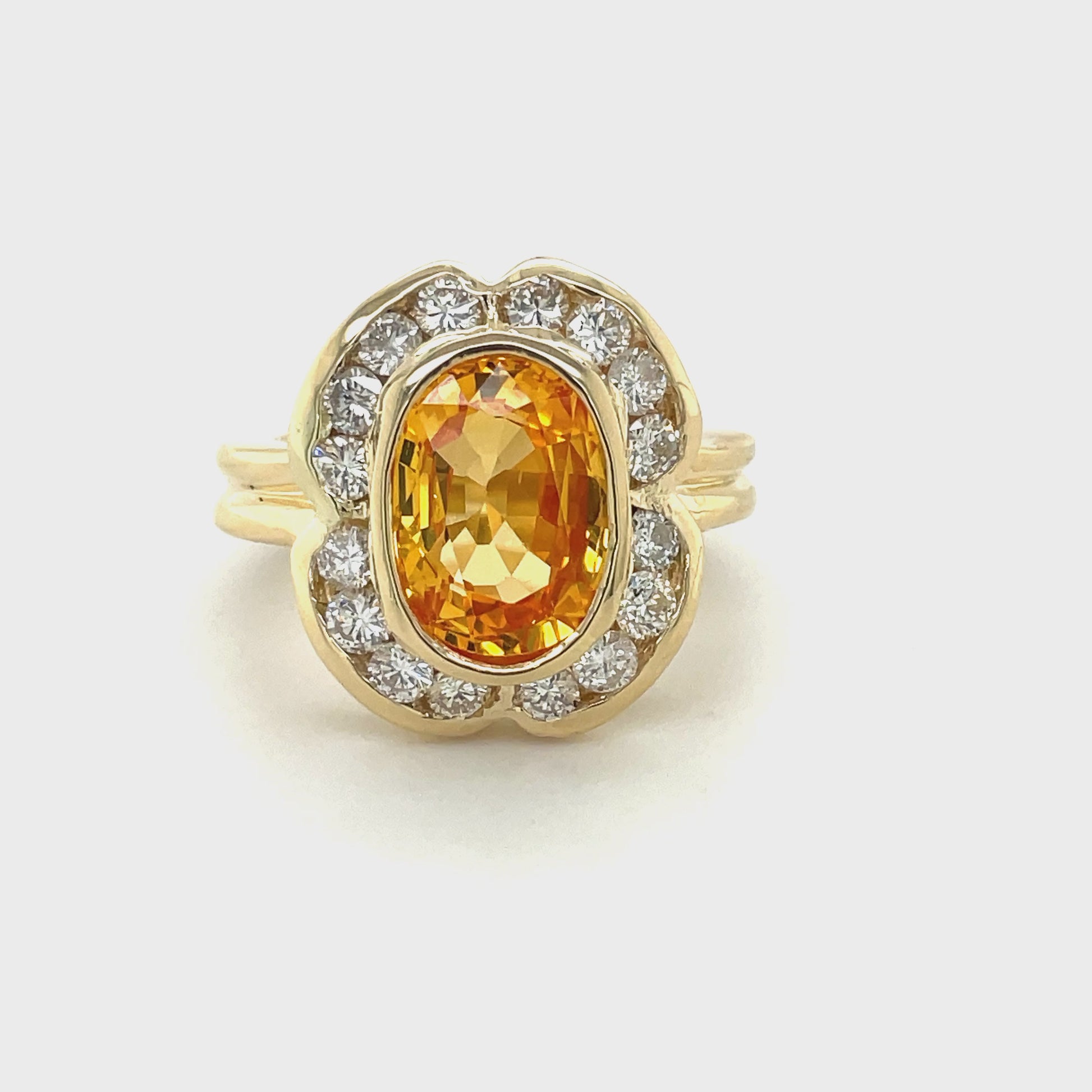 Try on viddeo of 14k Yellow Gold Orange Yellow Sapphire & Diamond Ring