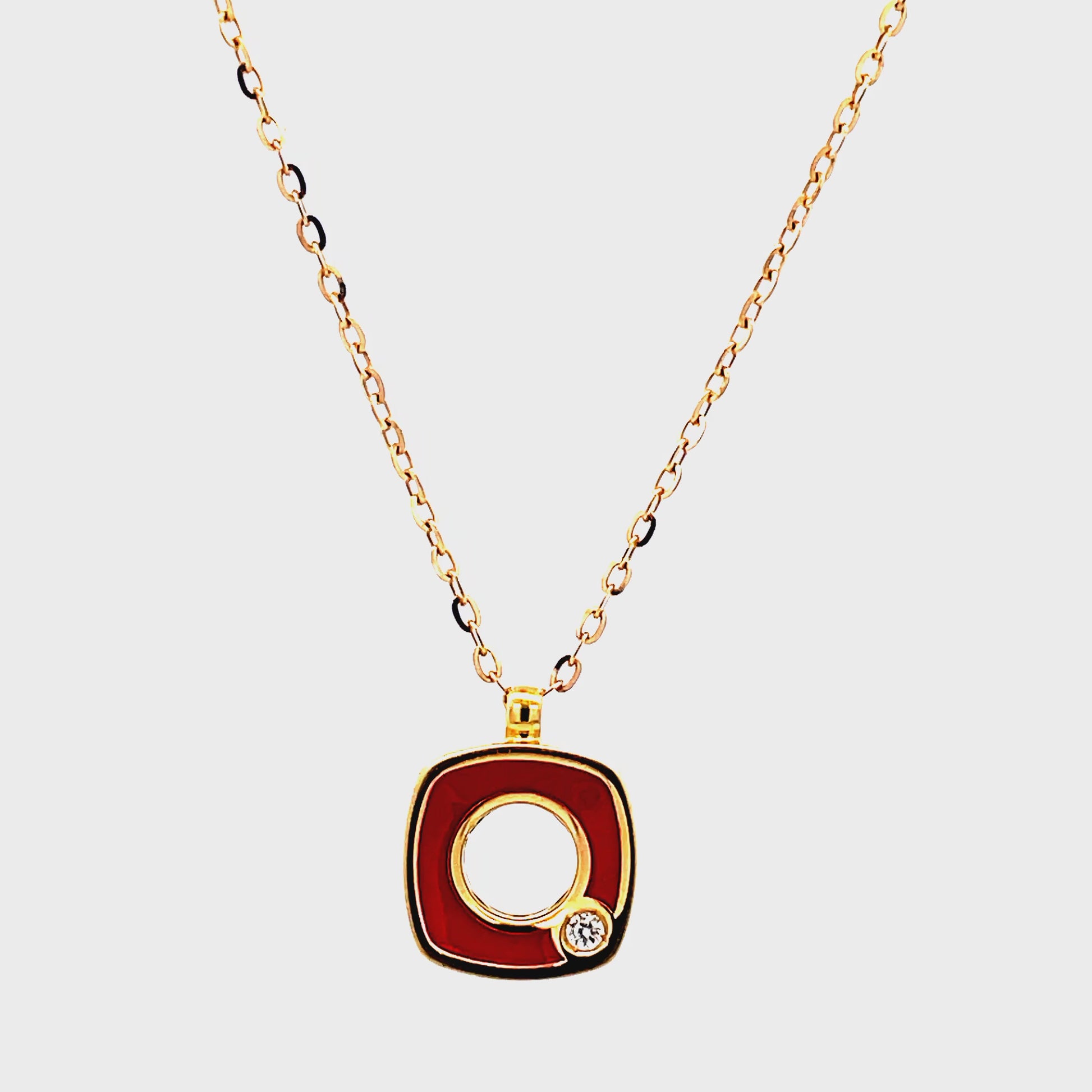 Try on view of 18K Italian Made Yellow Gold Red Enamel Diamond Square Pendant Necklace 18"