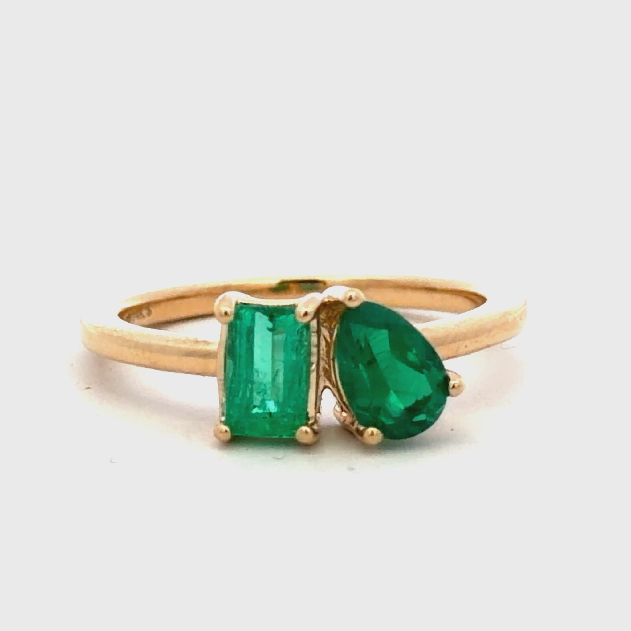 Try on  video of 14k Yellow Gold Two-Stone Emerald Ring