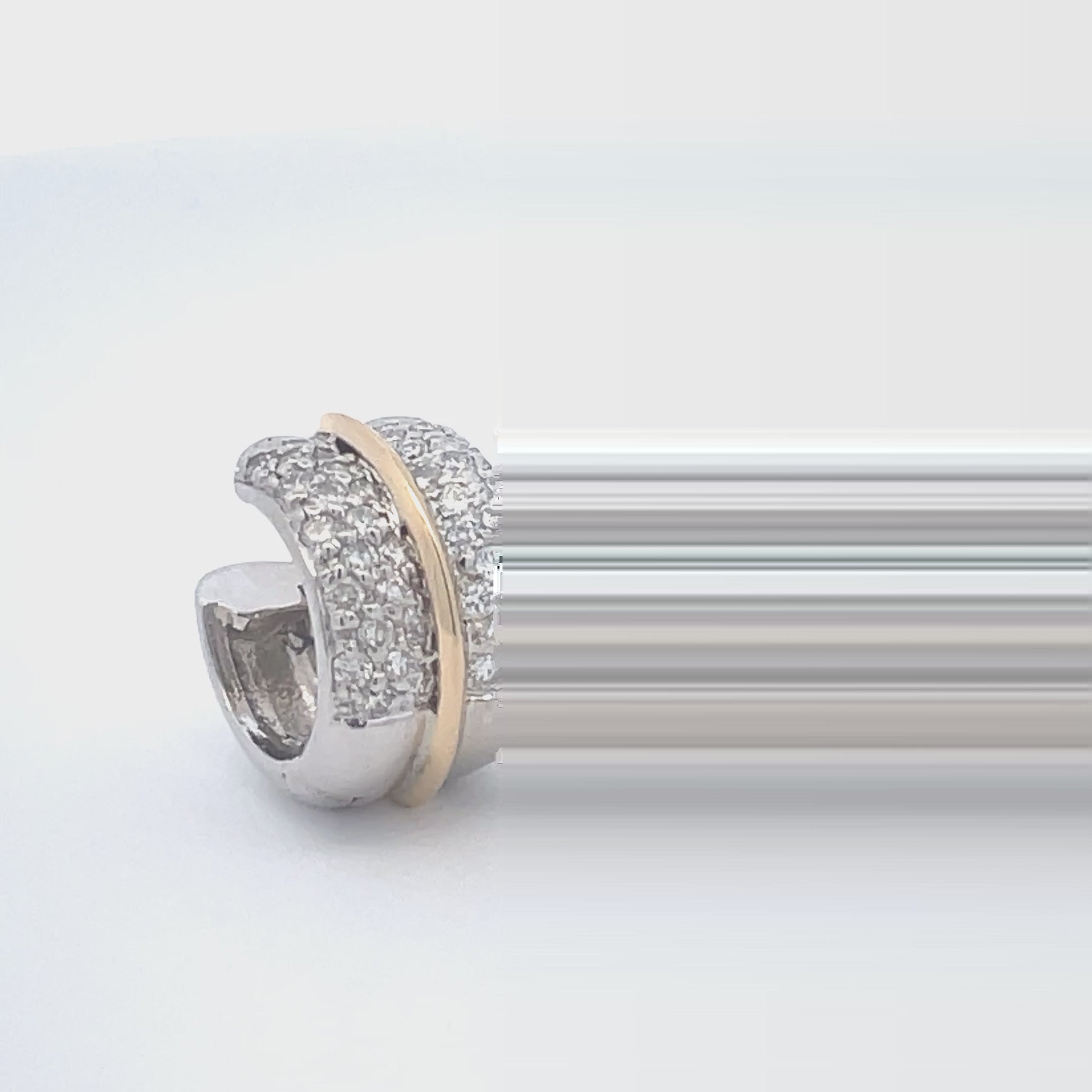 Watch front and side view video of Diamond Pave Two Tone Huggie Hoops