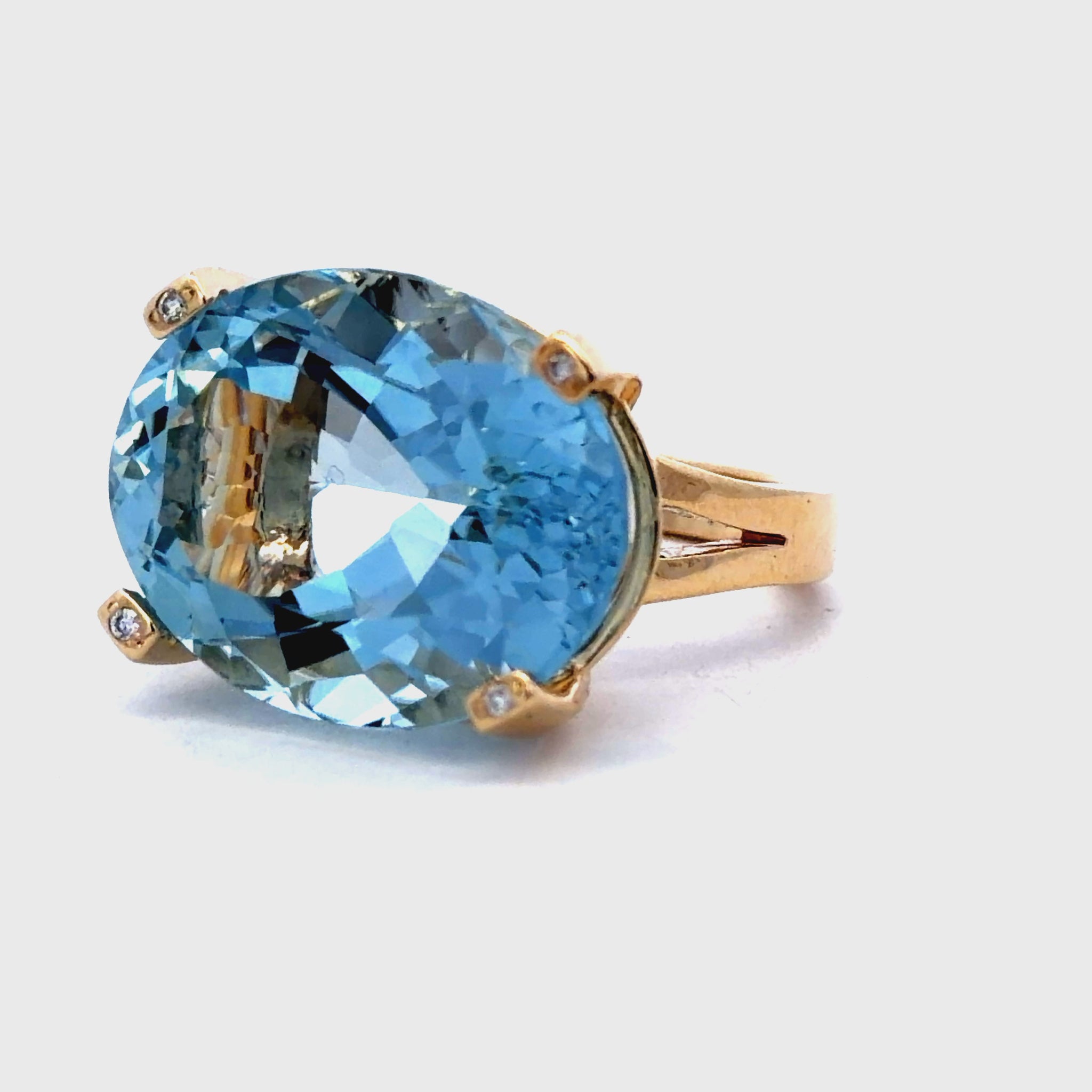 Try on video of Oval Aquamarine Solitaire & Diamond Ring in Yellow Gold