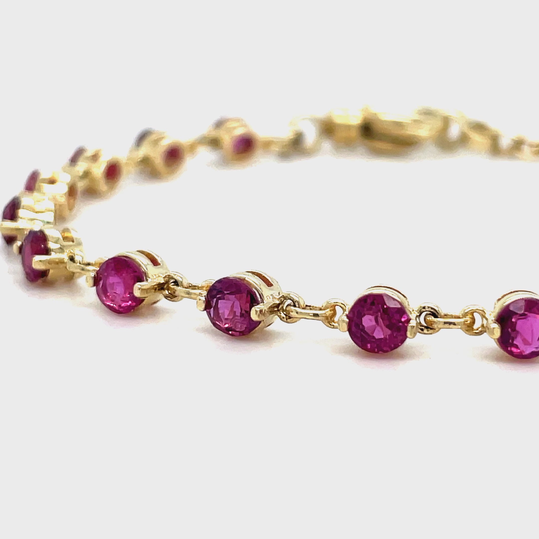 This Ruby Yellow Gold Bracelet features a sparkling round ruby weighing 3.60 carats. The 14k yellow gold setting is both elegant and durable, while the secure lobster catch ensures this bracelet stays comfortably on your wrist at 7" long. Enhance your look with this stunning piece.