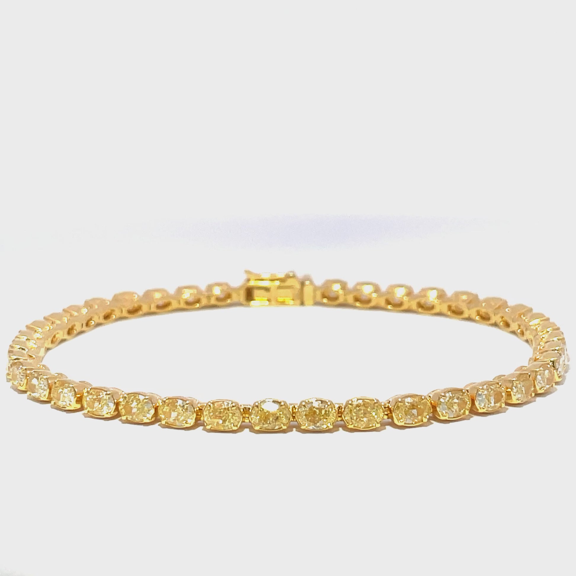 Watch Video of Fancy Yellow Diamond Oval Shape Line Bracelet