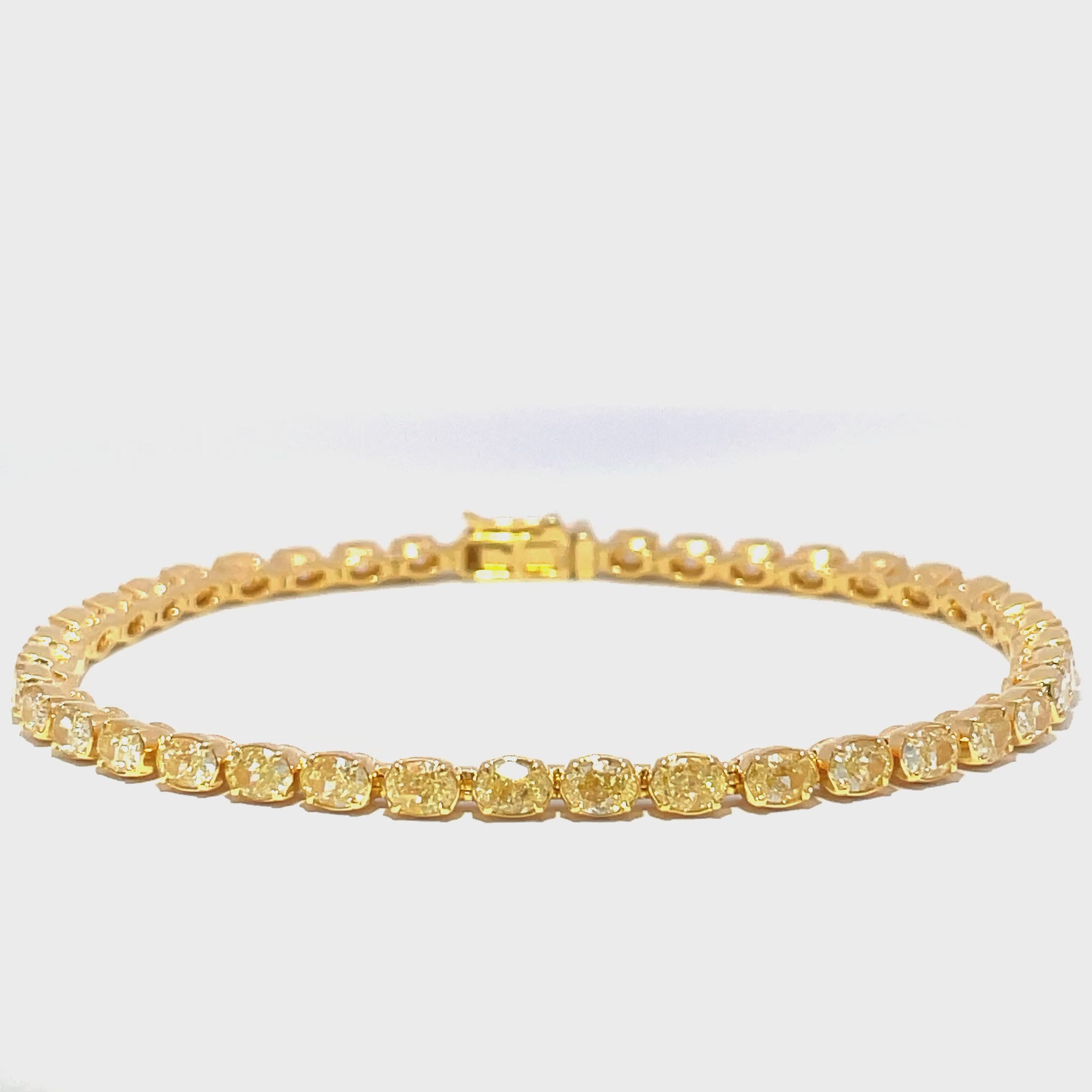 Watch Video of Fancy Yellow Diamond Oval Shape Line Bracelet