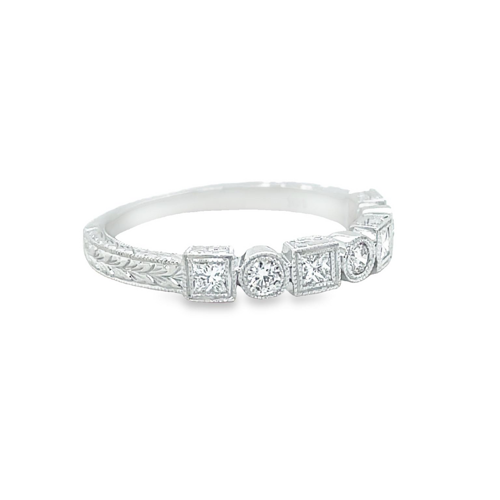 A timeless piece showcasing a classic art deco style crafted with 0.30 cts of round diamonds, set in 14k white gold. Available in size 6.5 and easily adjustable to any size for a custom fit. Enjoy its versatility as you stack and style it to complete your look.