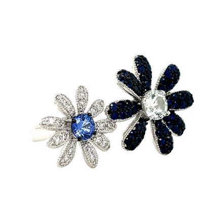 Enchanting and unique, this 18k white gold Double Daisy Flower ring boasts a mesmerizing 0.20 cts of shimmering diamonds and 0.82 cts of glorious sapphires. The 17.50 mm & 13.00 mm size 6.5 ring is simply divine and resizable to fit any finger. Dare to make a statement today!