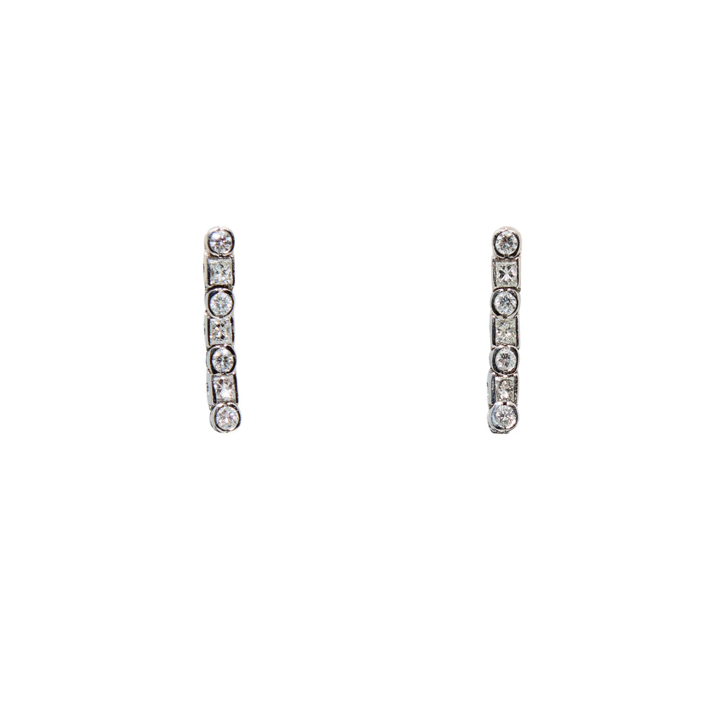 Gorgeous Diamond Drop Earrings feature 14 diamonds 1.15 cts set in 14k white gold with a removable setting. These earrings are 1 1/4" long, and include detachable 10.00 mm Akoya Pearls. A timeless and classic look for any occasions.  Good luster 