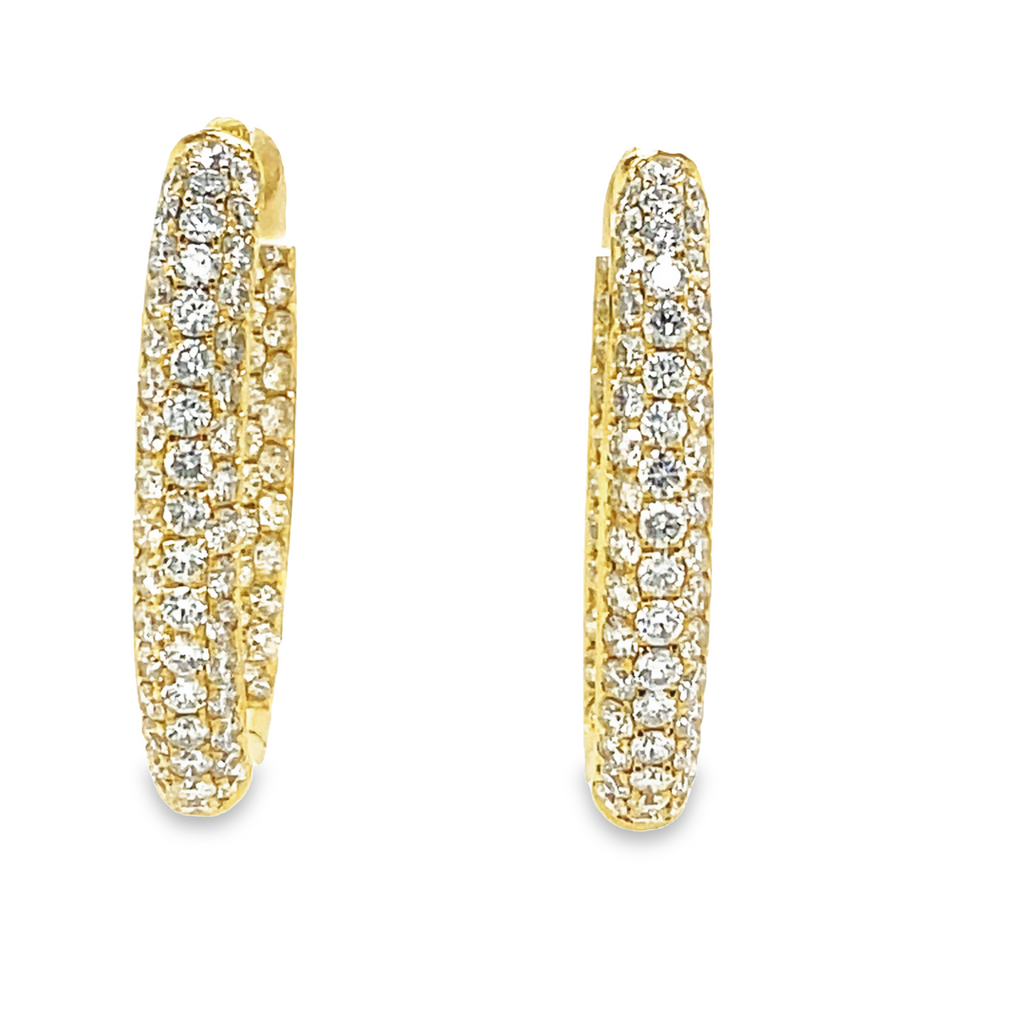 Stunning round diamonds 3.50 cts  Color E/F  Clarity Vs1  Set in 18k yellow gold.  Secure hinge system  4.20 mm wide  1" long