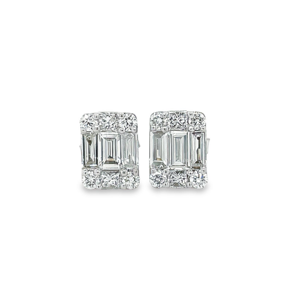 Extremely well made  High quality diamonds   Set in 18k white gold  Round diamonds 0.20 cts   Baguette diamonds 0.48 cts   Color F/G  Clarity VS1  Secure friction backs.  12.00 x 14.00 mm 