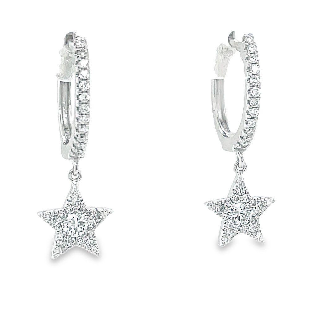 This 18k white gold huggie star earring is 13.00 mm in size and its star is 7.50 mm. It features a secure hinge system and contains 0.40 carats.