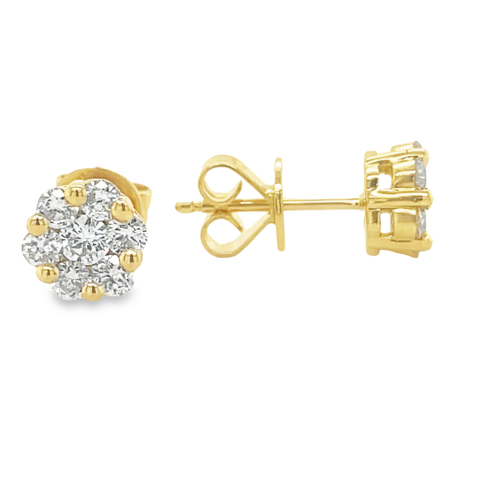 Dainty diamond earrings.   18k yellow gold  Secure heart shaped friction backs  Round diamonds 0.80 cts  7.00 mm long
