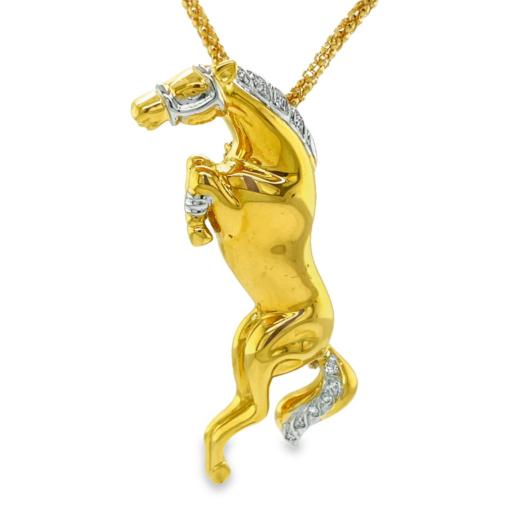 Very stylish  Great workmanship  18k yellow gold.  Italian made.  Horse pendant 2.00" long  1/2'" wide   Round diamonds 0.10 cts   18" long chain italian made $455 (optional)  Secure lobster catch  It can be used as a pin also