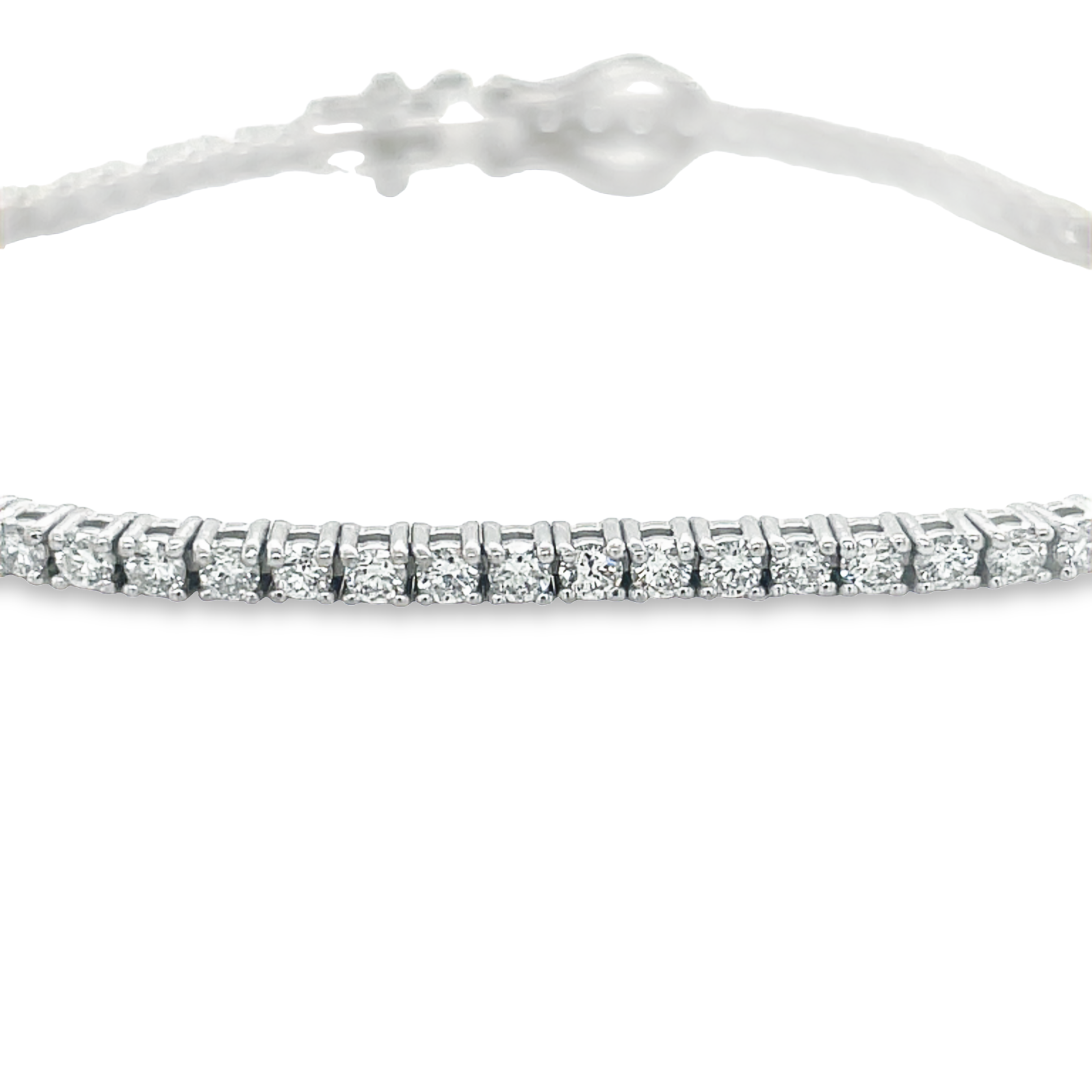 Ladies Line bracelet   2.07 cts round cut diamonds   Color F-G  Clarity SI-1-2 All prong set  7" length  14kt white