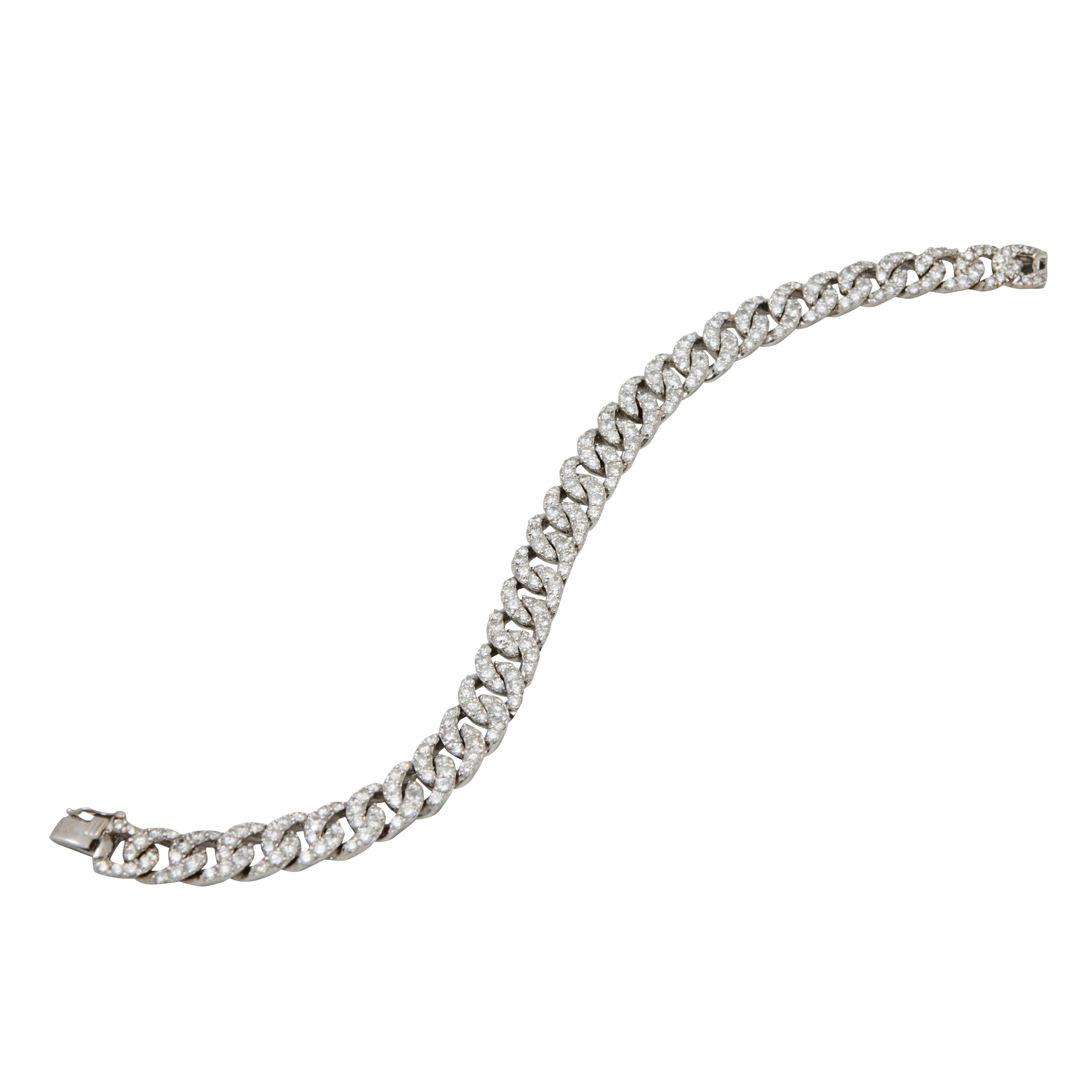 This 18k white gold chain link diamond bracelet features 7.58 carats of round diamonds for sparkle and shine. The bracelet is 7 1/4" long and features a hidden clasp for security and a classic curb link design.