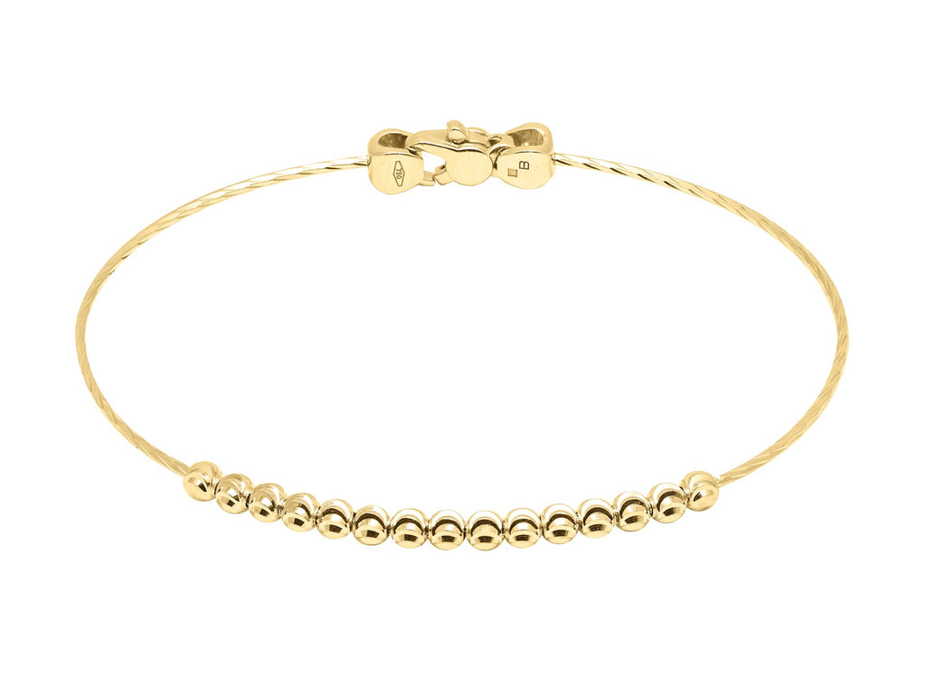 Diamond cut 3.00 mm beads 18k yellow gold Italian collection from Officina Bernardi Secure lobster clasp 7" bangle